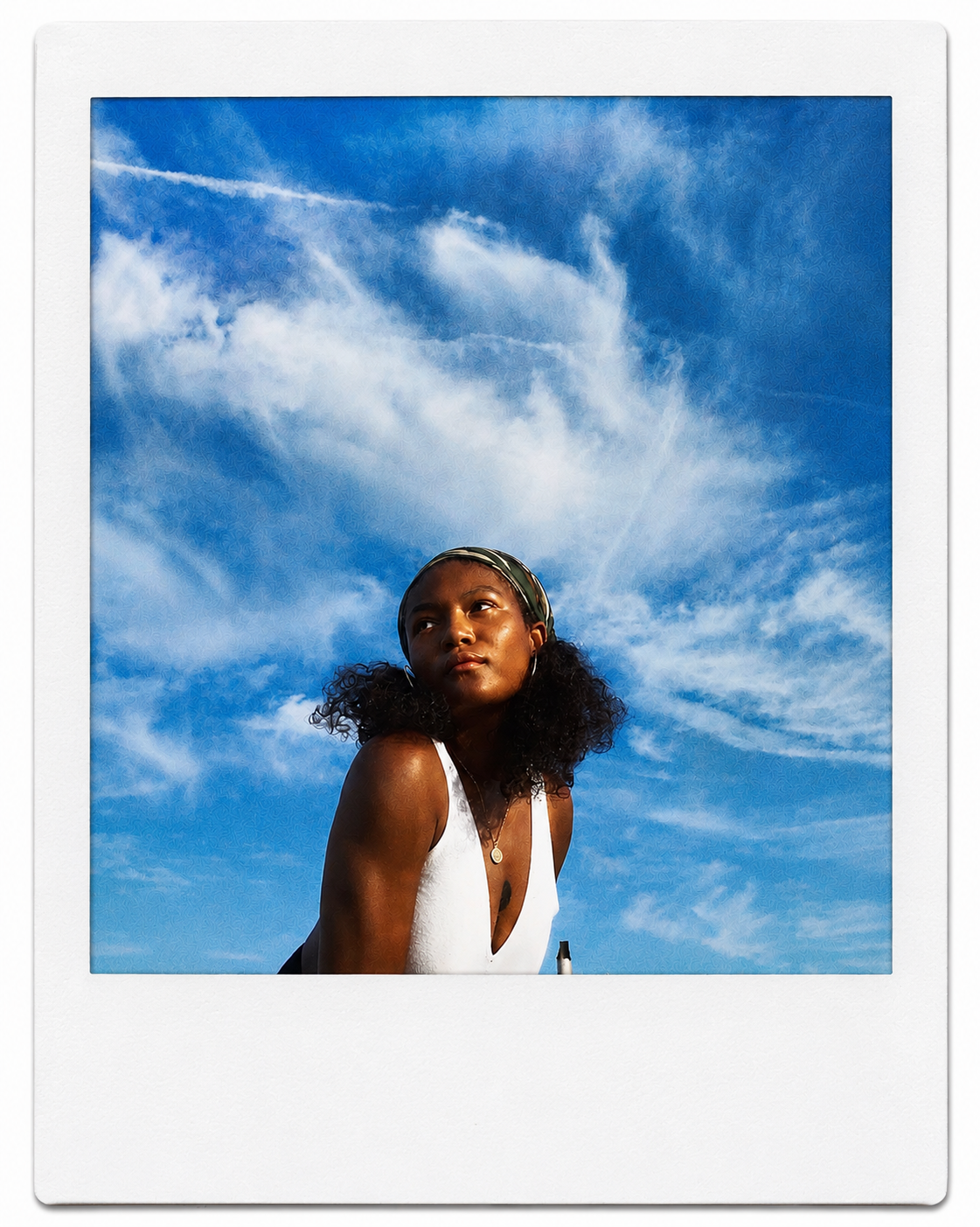 Portrait of Shawn Nicole Thompson under a bright blue sky